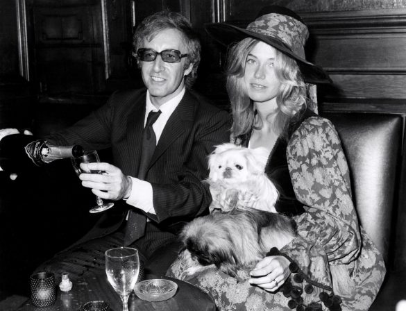 Miranda Quarry (1957 - ) the stepdaughter of Lord Mancroft, deputy chairman of Cunard's at her wedding reception following her marriage to Peter Sellers. They are at the discoteque 'Tramp' in Jermyn Street, drinking champagne and sitting with them are Miranda's two pekinese dogs. Original Publication: People Disc - HK0443 Original Publication: People Disc - HK0443 (Photo by Central Press/Getty Images)